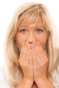 woman looking for bad breath cures